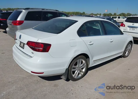 2017 Volkswagen Jetta 1.8T Sel z USA, uszkodzony, nr VIN 3VWL17AJ1HM232767